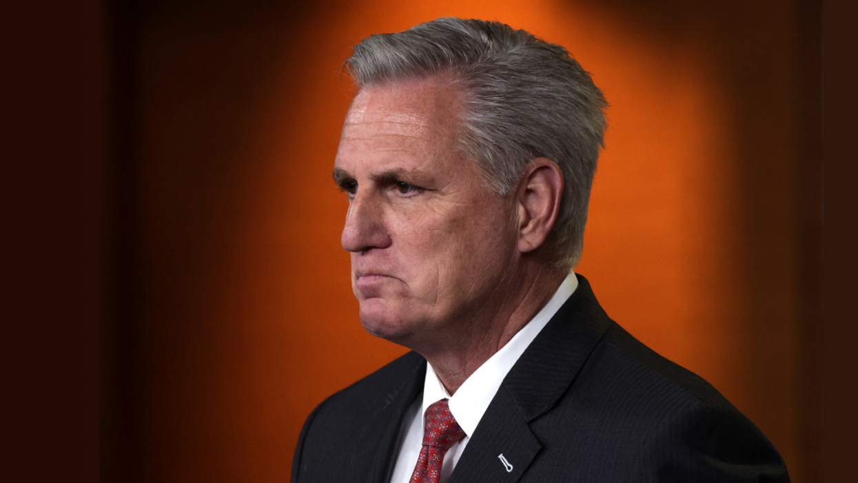 Former House Speaker Kevin McCarthy looks off-camera to the left. He is strongly frowning.