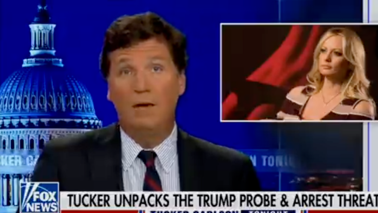 Fox News screenshot of Tucker Carlson discussing the hush money payment to Stormy Daniels