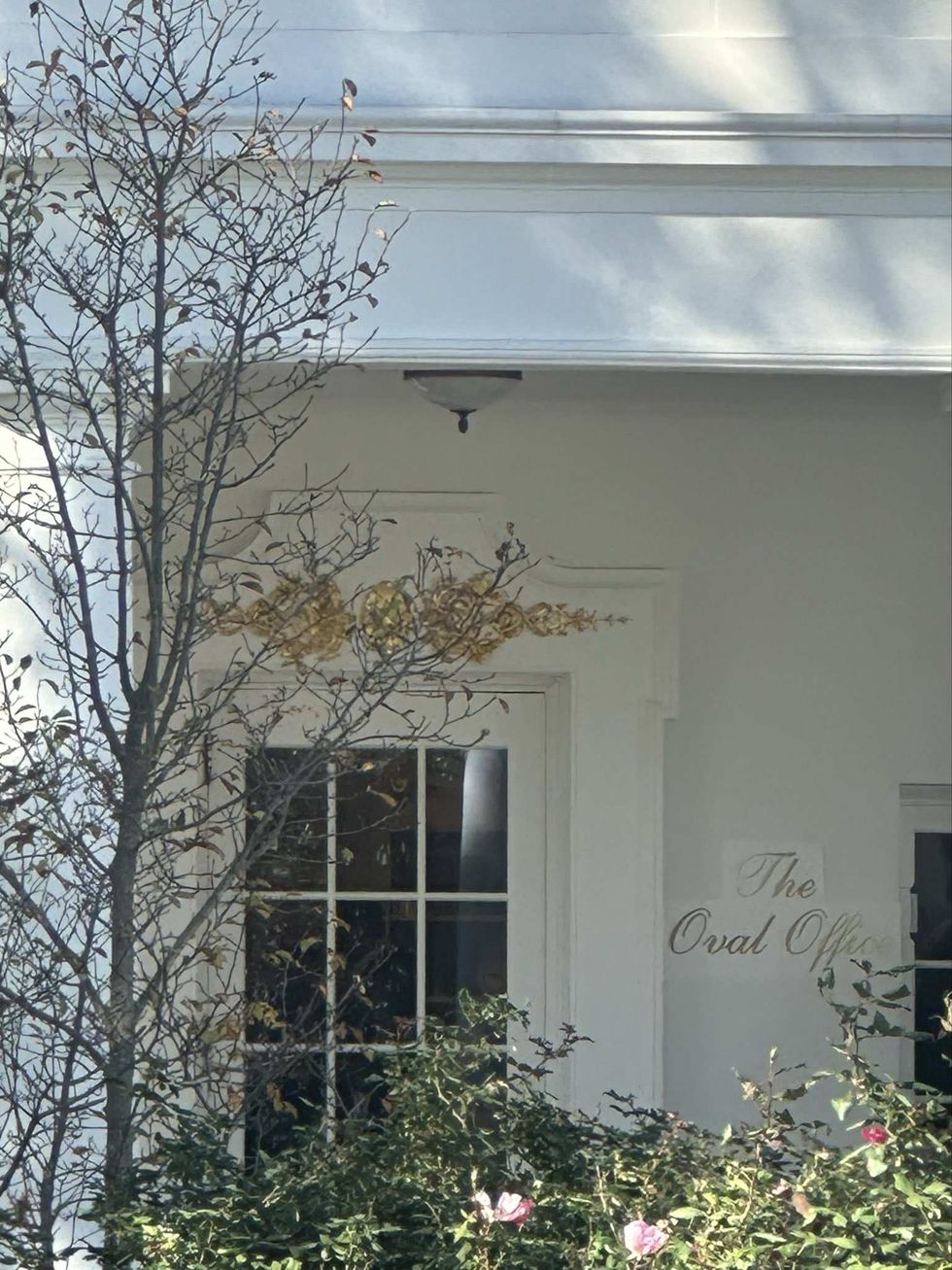 Golden "The Oval Office" sign