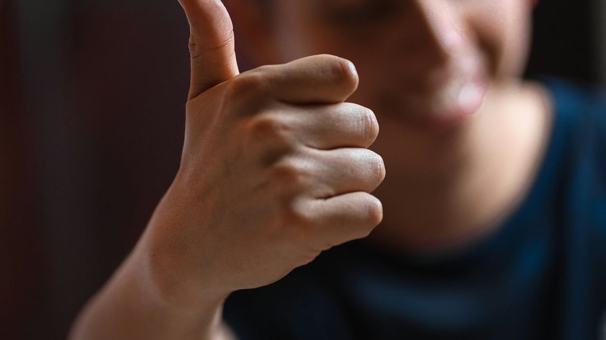 Guy giving thumbs up