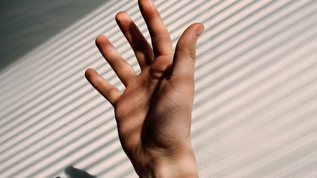 Hand reaching up