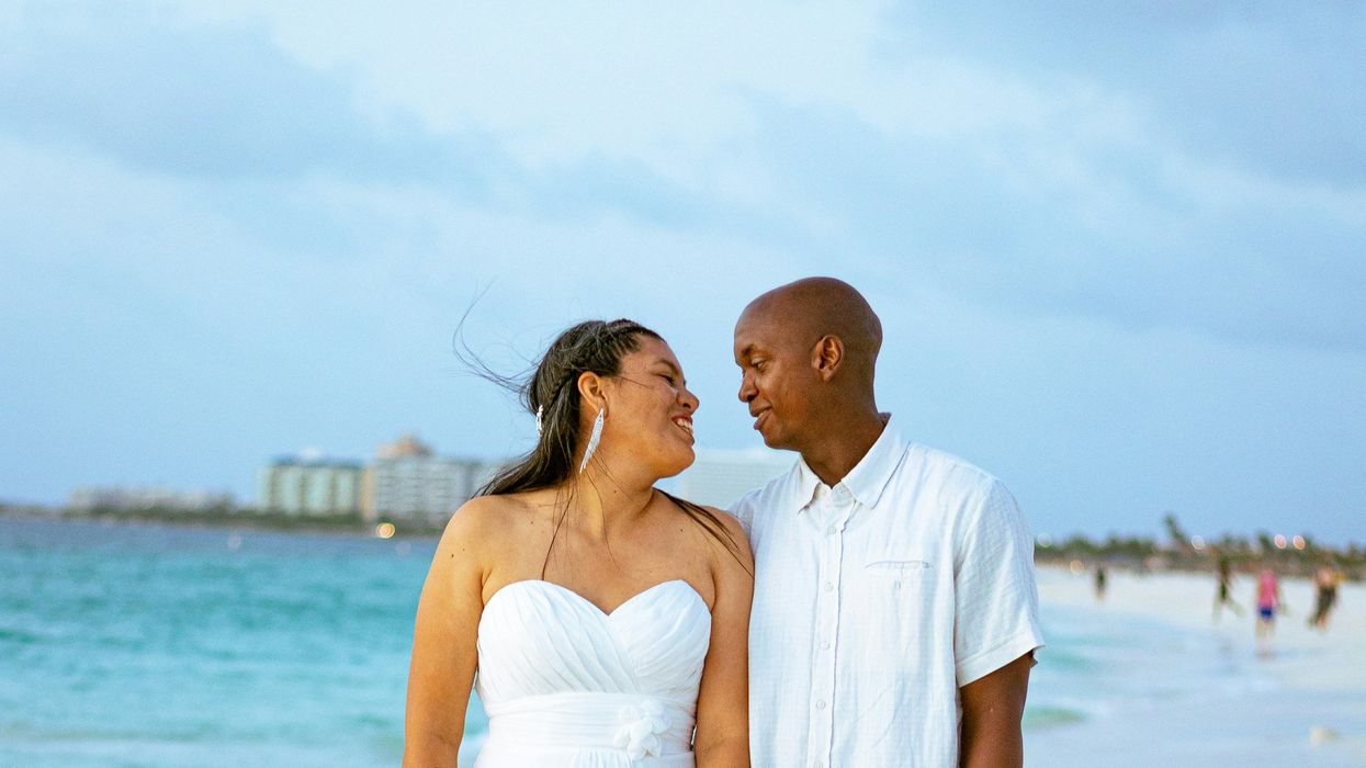 Happy newlyweds on the beach
