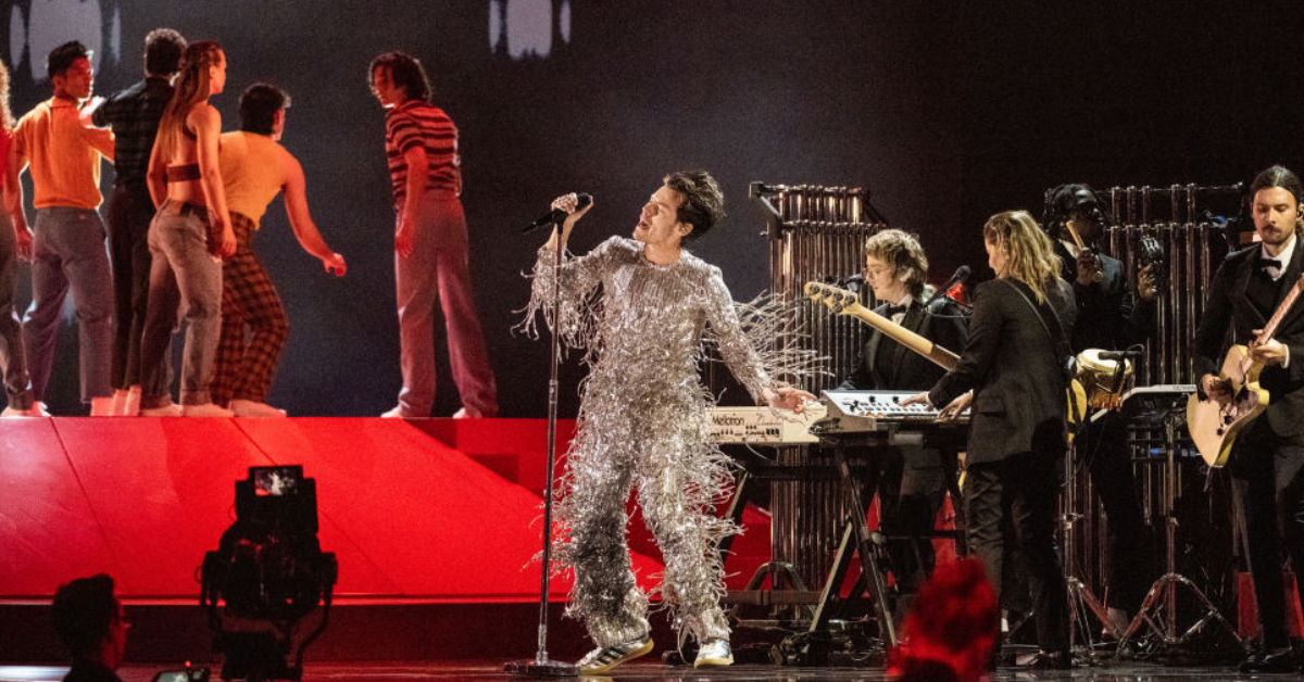 Harry Styles, dancers and band performing at Grammys