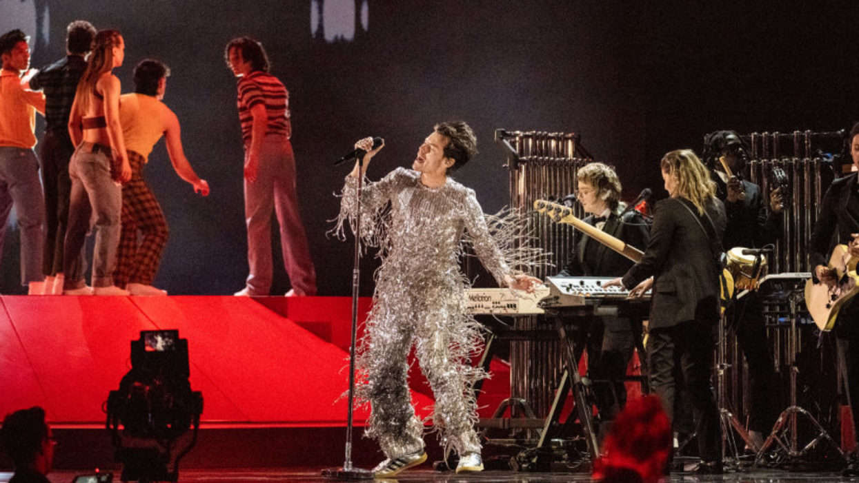 Harry Styles, dancers and band performing at Grammys