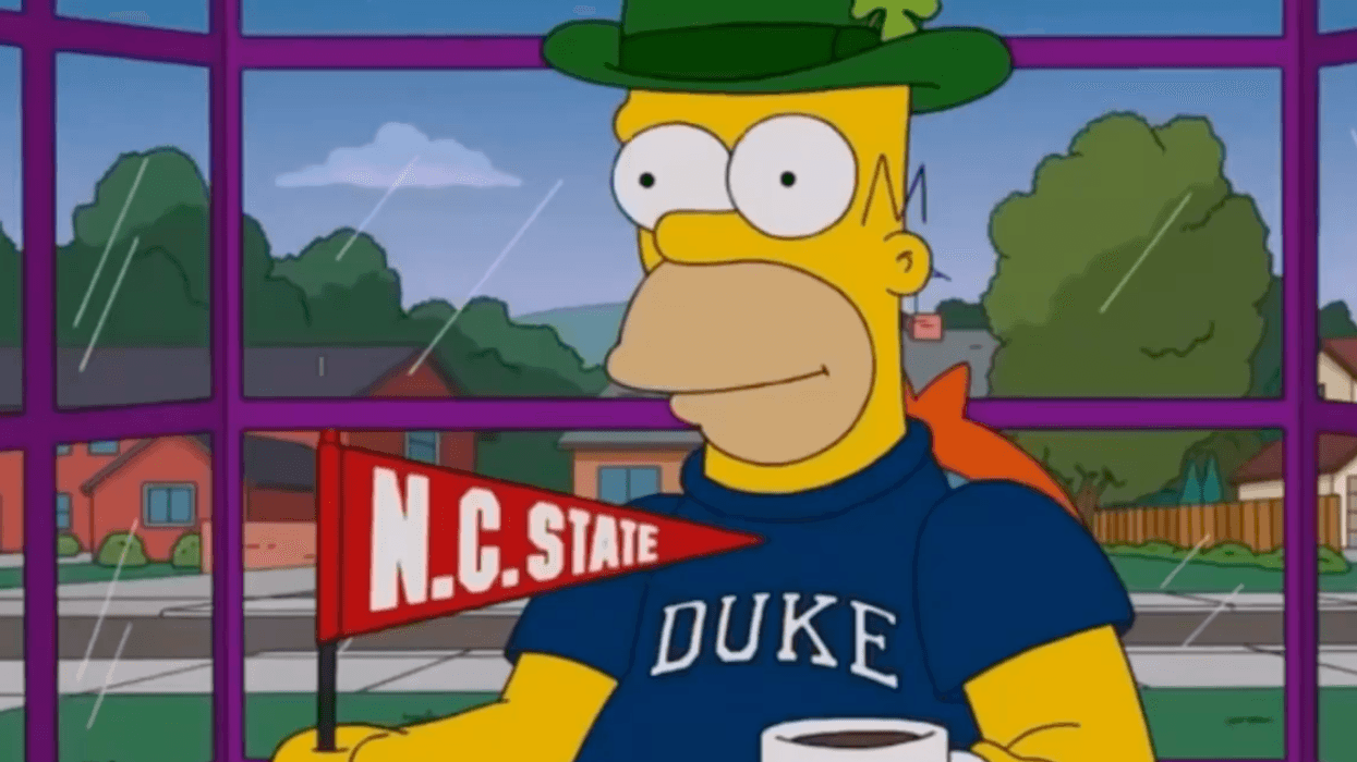 Homer Simpson with NC State flag and Duke shirt
