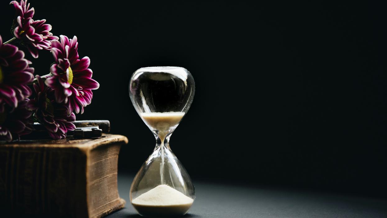 Hour glass on table