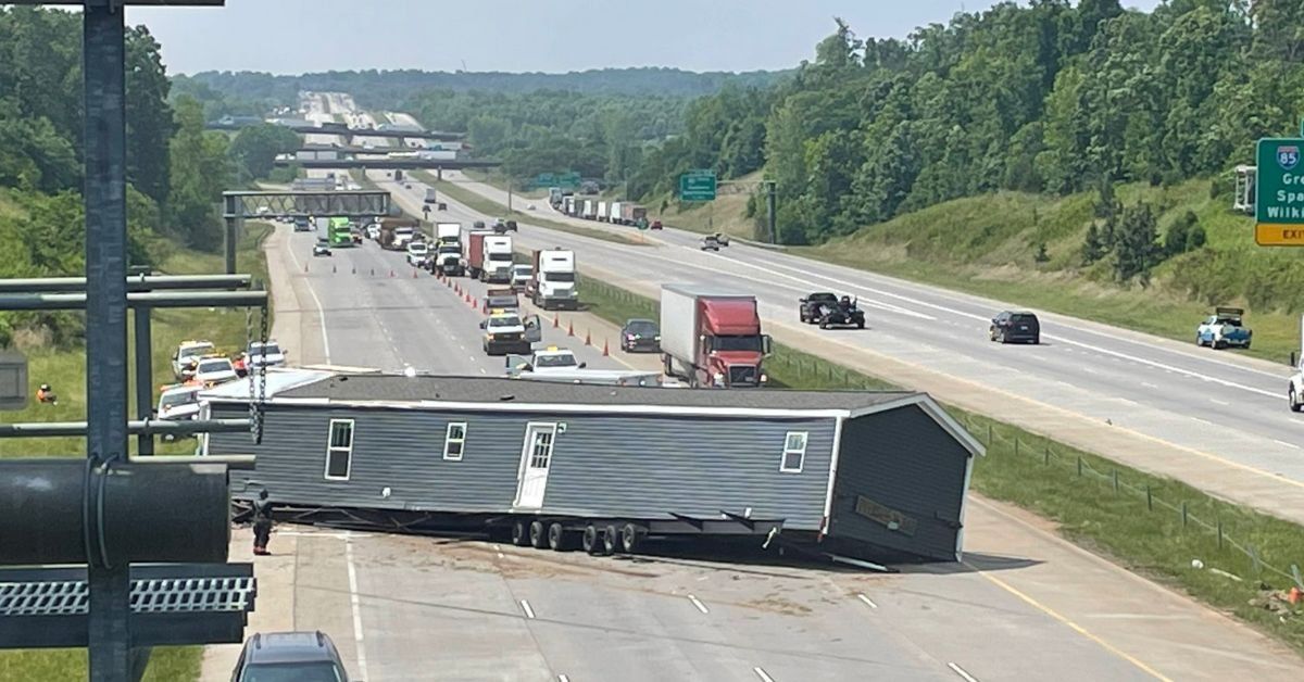 House blocking highway traffic