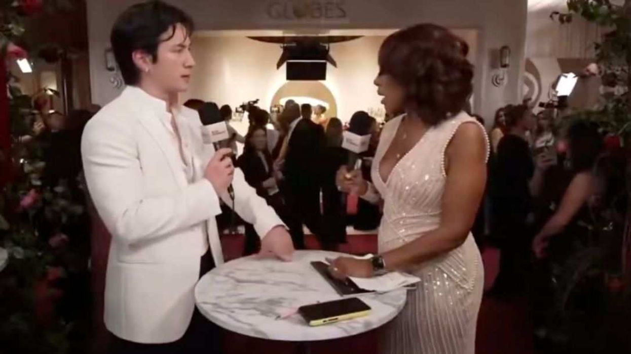Hudson Williams chats with Gayle King on the red carpet at the 2026 Golden Globe Awards.