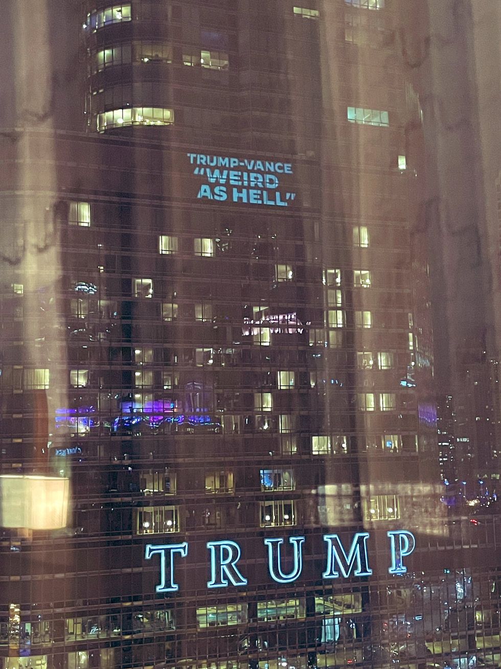 Image of Trump Tower with "Trump-Vance: Weird as Hell" message