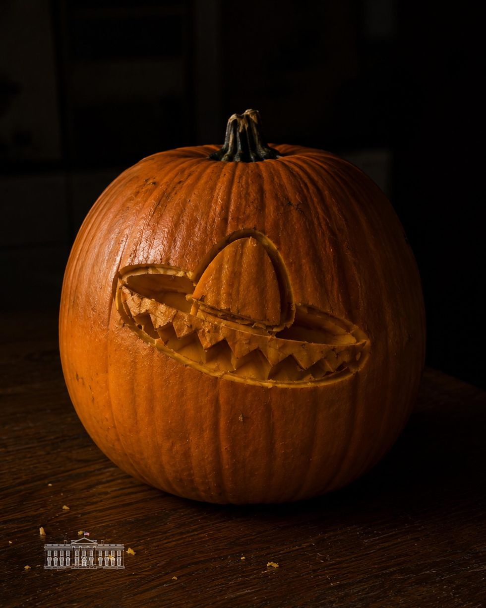 Image, watermarked by the White House, showing a pumpkin with a sombrero carved into it