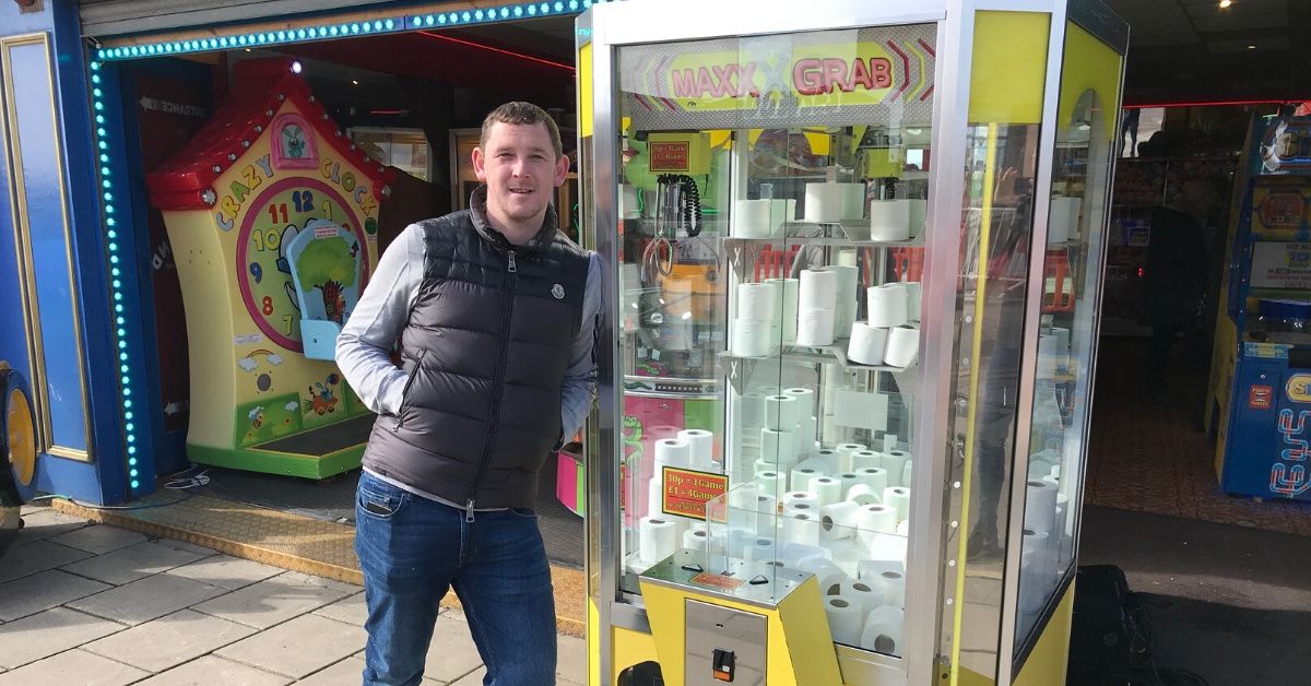 Arcade Trolls Frenzied Stockpilers By Filling Claw Machine With Toilet Paper Rolls