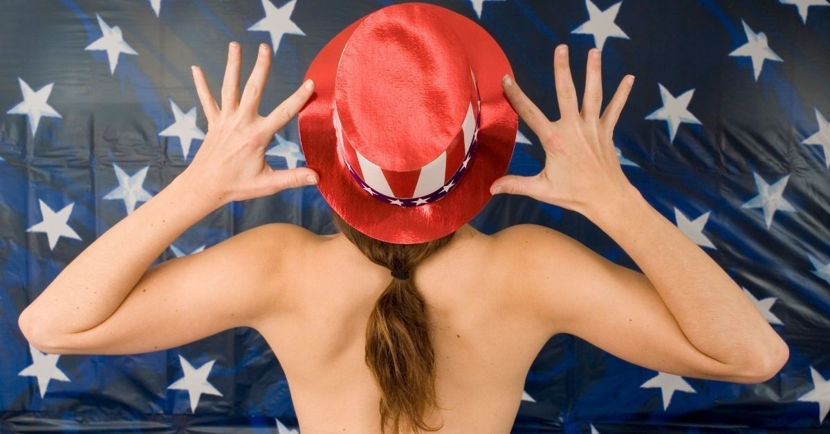 New Hampshire Voter Was Told She Couldn't Wear Her Anti-Trump Shirt, So She Whipped It Off And Voted Topless
