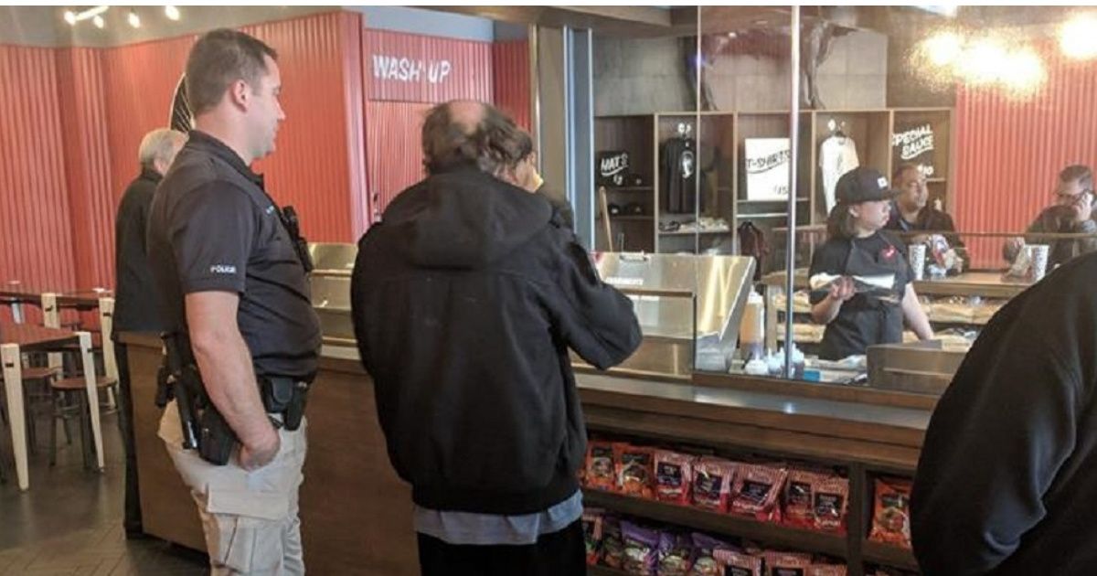 Cop Praised After His Act Of Kindness For A Hungry Homeless Man Goes Viral