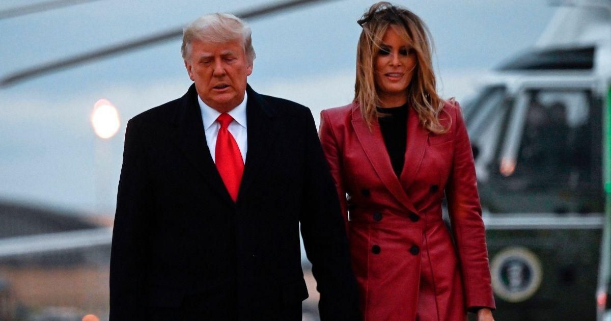People Are Accusing Melania Of Photoshopping Her Official Christmas Portrait With Donald