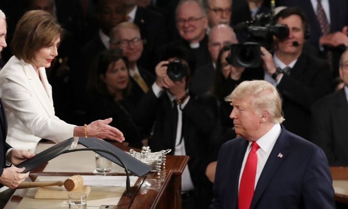 Barack Obama's Former Photographer Expertly Trolls Trump For Snubbing Nancy Pelosi's Handshake At The SOTU