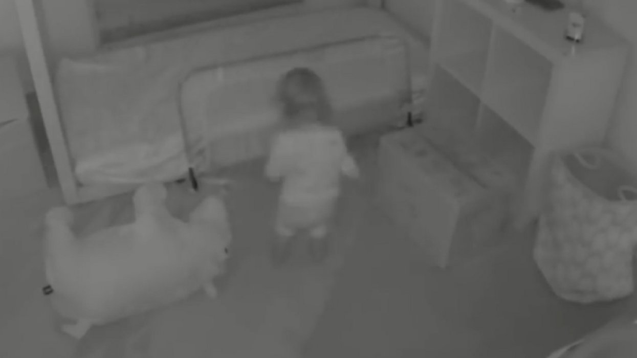 Toddler's Escape Method Caught On Hidden Camera—And It Looks Like She Has Some Help