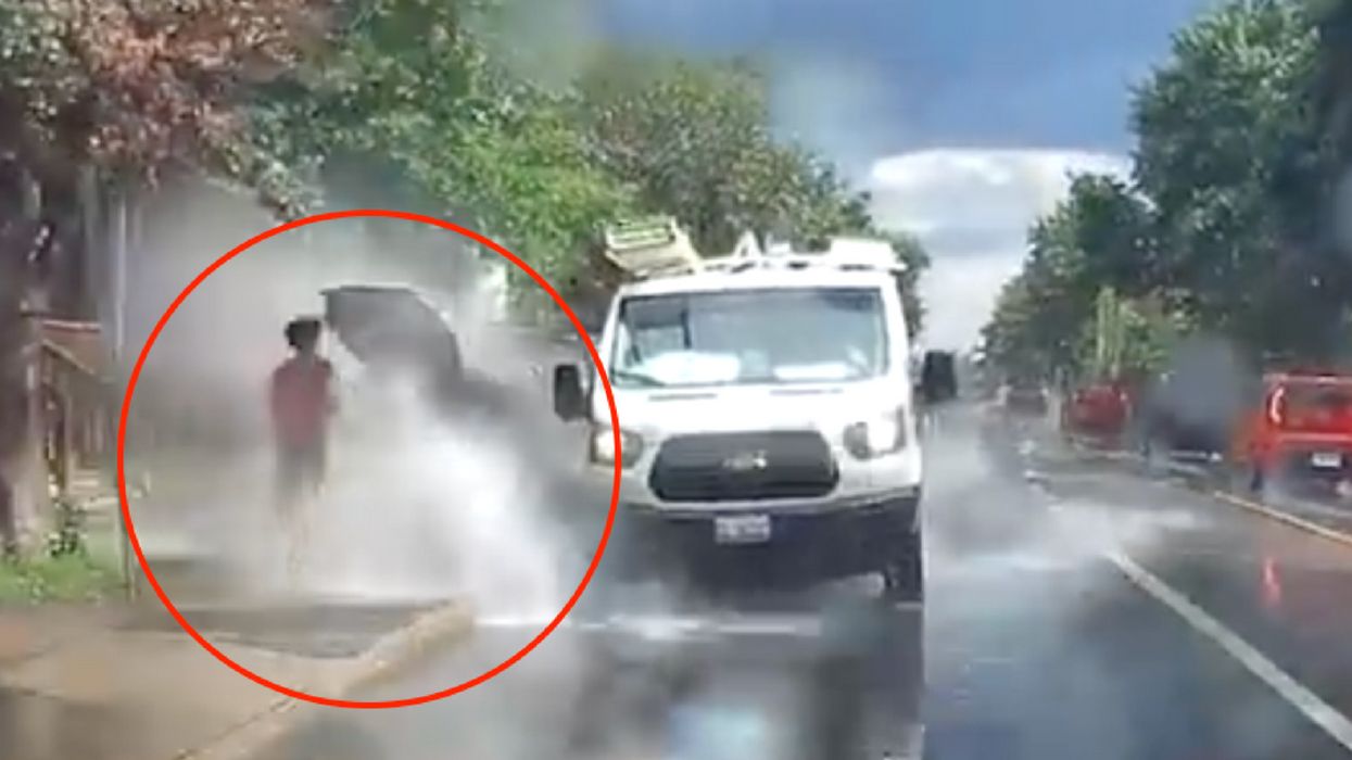 Driver Fired After Being Caught On Camera Swerving Into Puddles To Splash Pedestrians