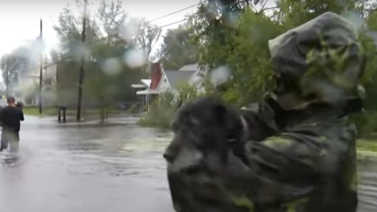 Viral Videos Show Pastor Rescuing Family Pets Left Behind During Florence
