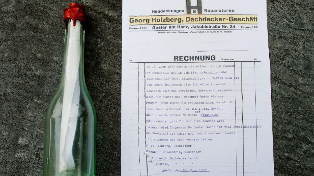 German Roofer Discovers Message In A Bottle Hidden In Cathedral—And It Was Written By His Own Grandfather
