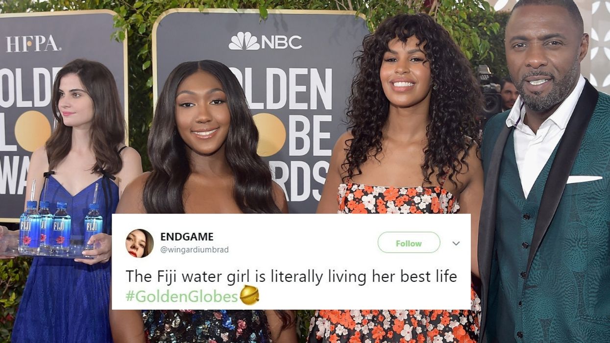 The Real Star Of The Golden Globes Red Carpet Was...That Fiji Water Lady? 😮