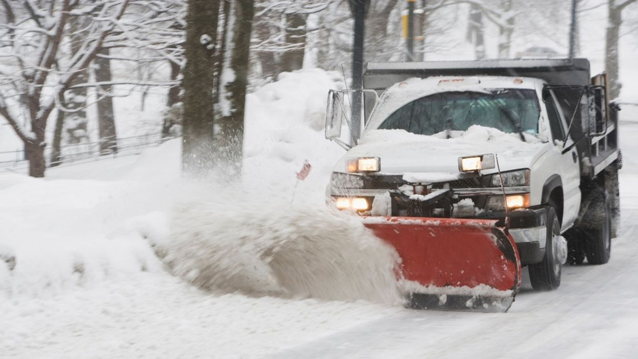 Snow Plow Driver Gets A Shock After Finding Car Buried In Snow With Driver Still Inside