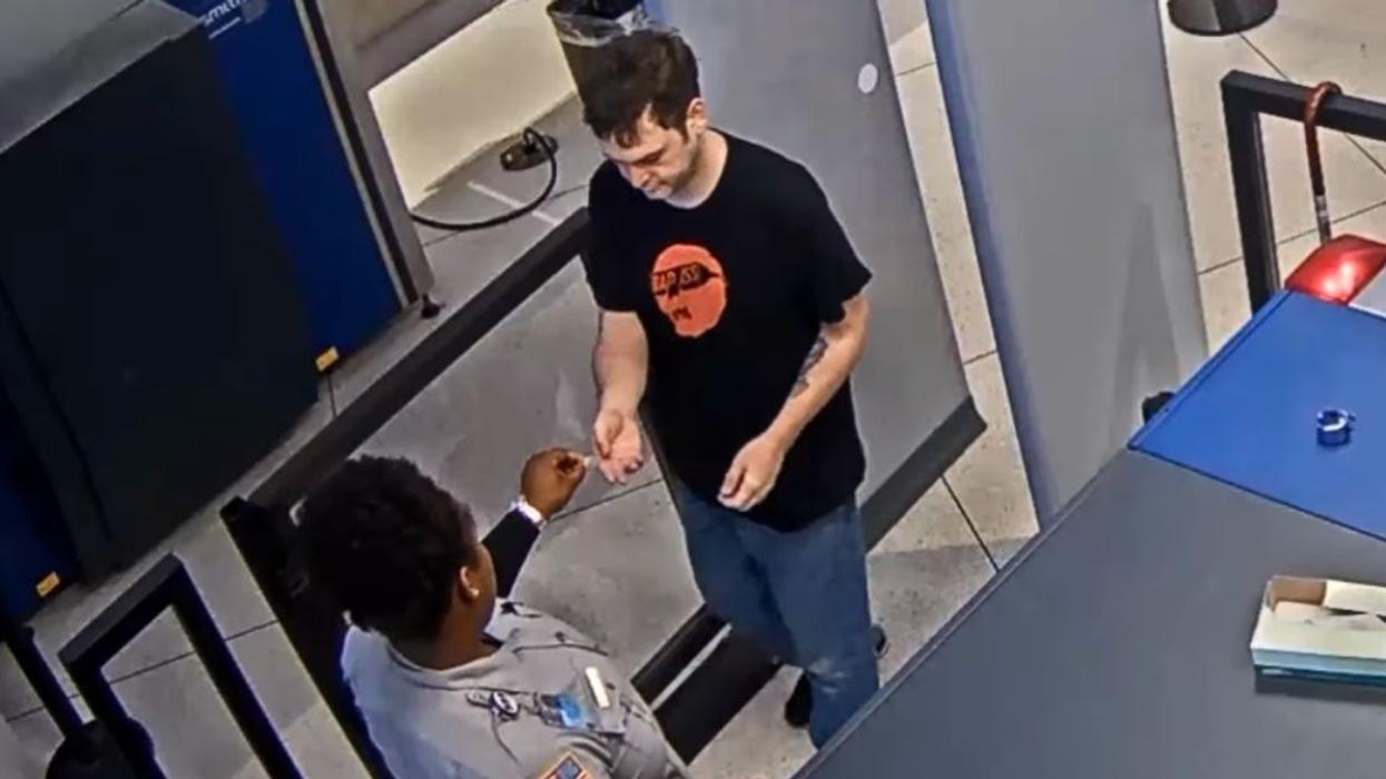 Airport Worker Fired After Video Shows Her Slipping A Passenger A Note Calling Him 'Ugly'