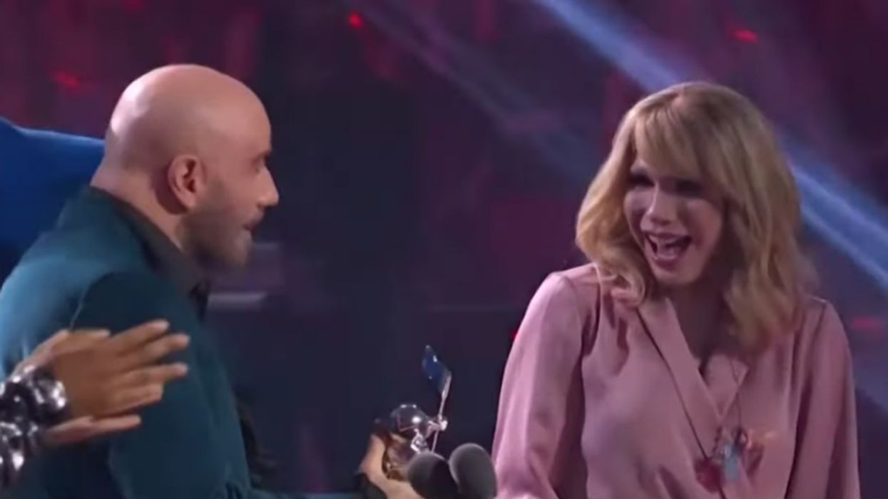 John Travolta Seemingly Mistakes Drag Queen For Taylor Swift During Awkward VMAs Moment