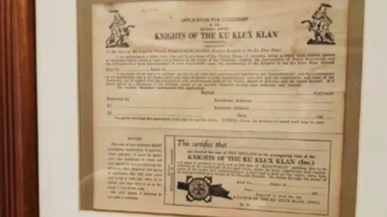 Michigan Cop Placed On Leave After Family Finds Framed KKK Application In His House