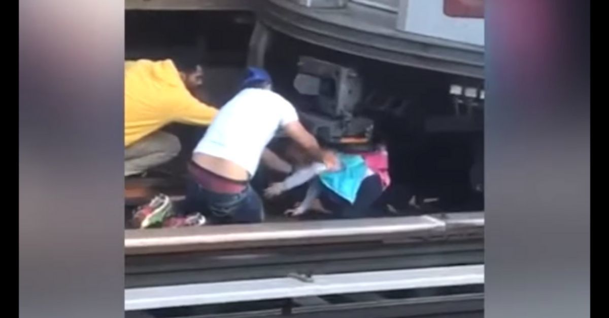 Dramatic Video Shows Commuters Rescuing 5-Year-Old Girl From Under Subway Train After Dad's Suicide
