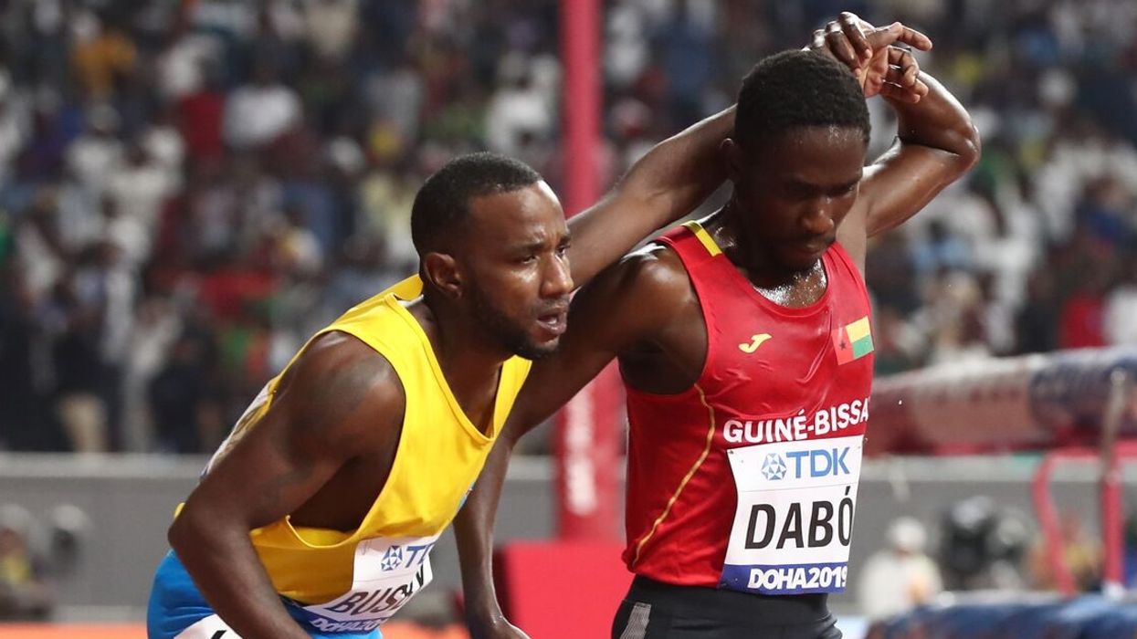 Distance Runner Sacrifices His Own 5,000 Meter Race To Help Exhausted Fellow Competitor Cross The Finish Line