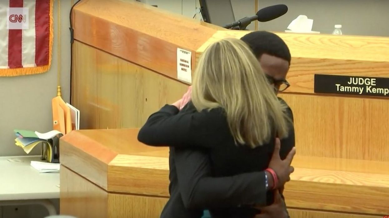 Emotional Moment Of Forgiveness Between Convicted Dallas Cop And Slain Neighbor's Brother Divides The Internet