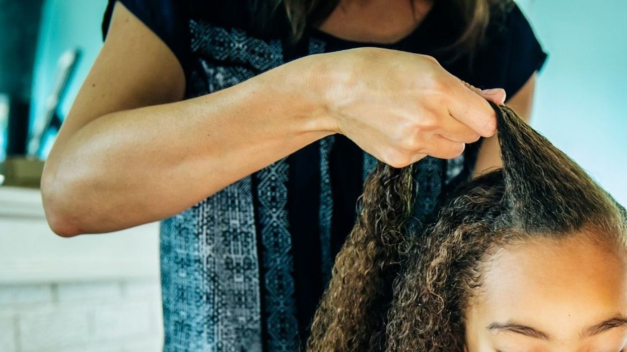 Mom Accused Of 'Erasing' Biracial Daughter's Identity For Brushing Curls Out Of Her Hair