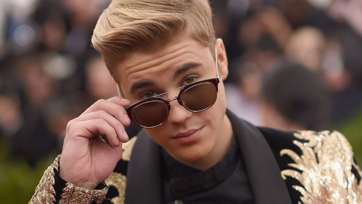 Justin Bieber Just Discovered That Hilarious Photo Of Himself Falling Off A Unicycle—And He's Rightfully Obsessed