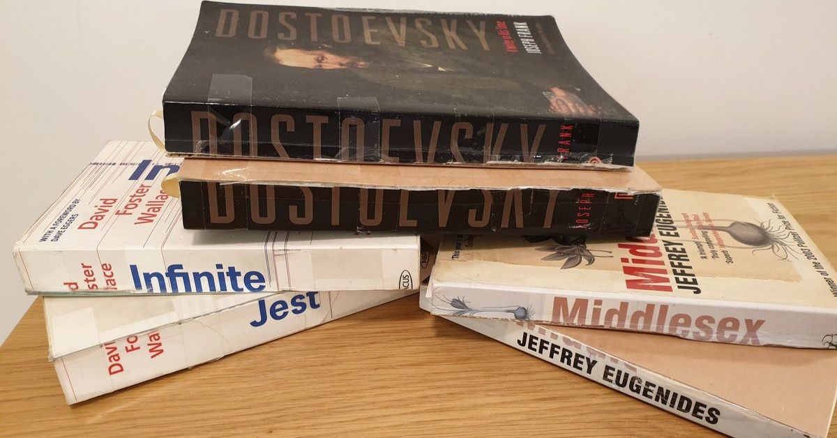 Guy Horrifies Book Purists After Admitting That He Cuts Lengthy Books In Half For Easier Transport