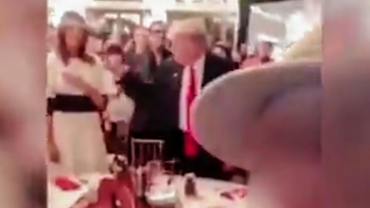 Leaked Video of Trump Goofing Off During National Anthem at Sunday's Super Bowl Has People Calling Him Out