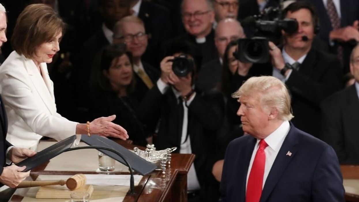 Barack Obama's Former Photographer Expertly Trolls Trump For Snubbing Nancy Pelosi's Handshake At The SOTU