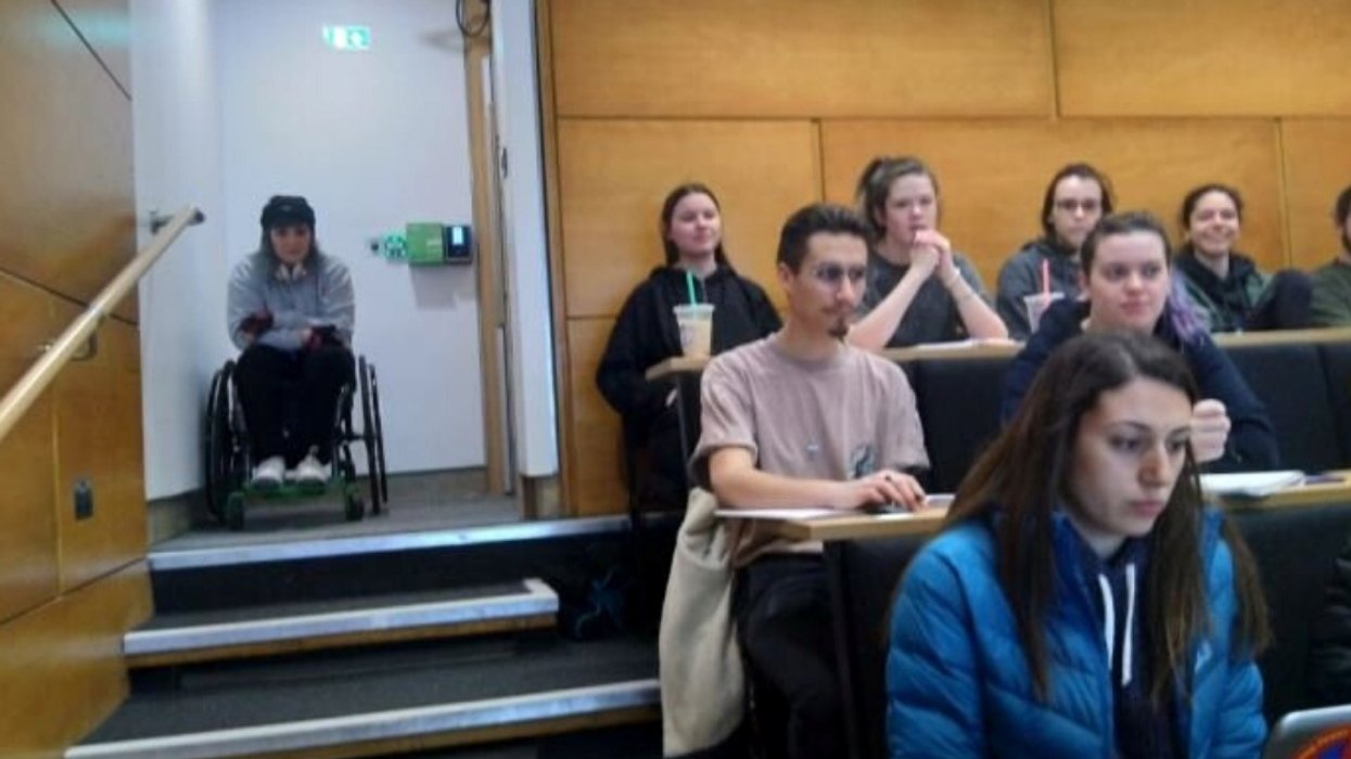 Wheelchair-Using Student Calls Out University For Discrimination After Being Forced To Sit In Stairwell Of Lecture Halls