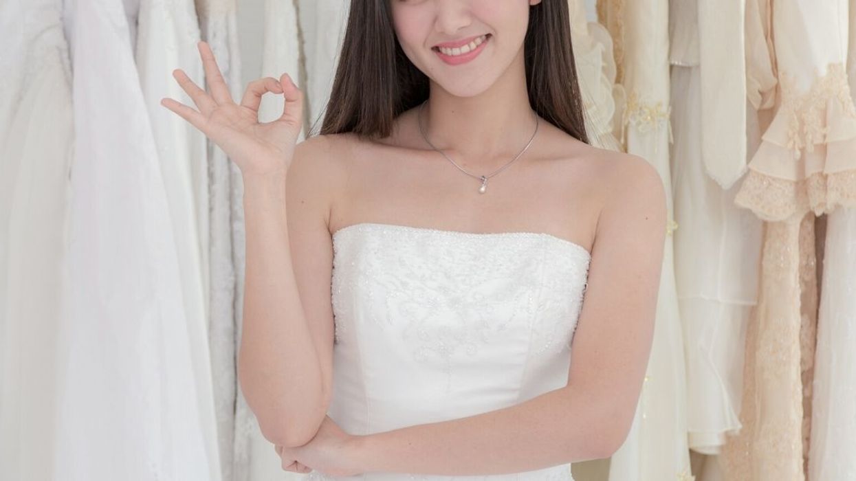 Woman's Boyfriend Kicks Her Out And Breaks Up With Her After She Jokingly Sends Him A Photo Of Herself In A Wedding Dress