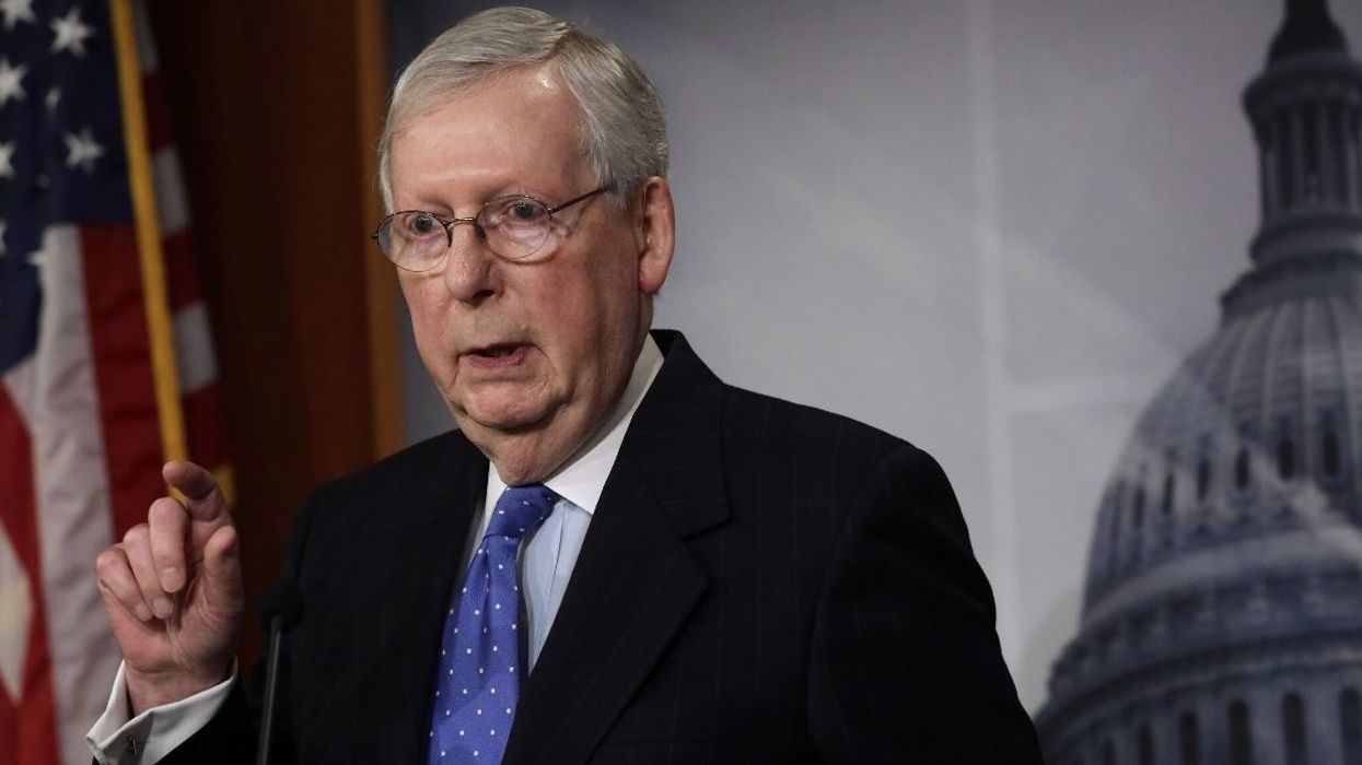 Hilariously Bizarre Photo Of Mitch McConnell Surrounded By Social Distancing Reporters Has A Very 'Harry Potter' Vibe To It