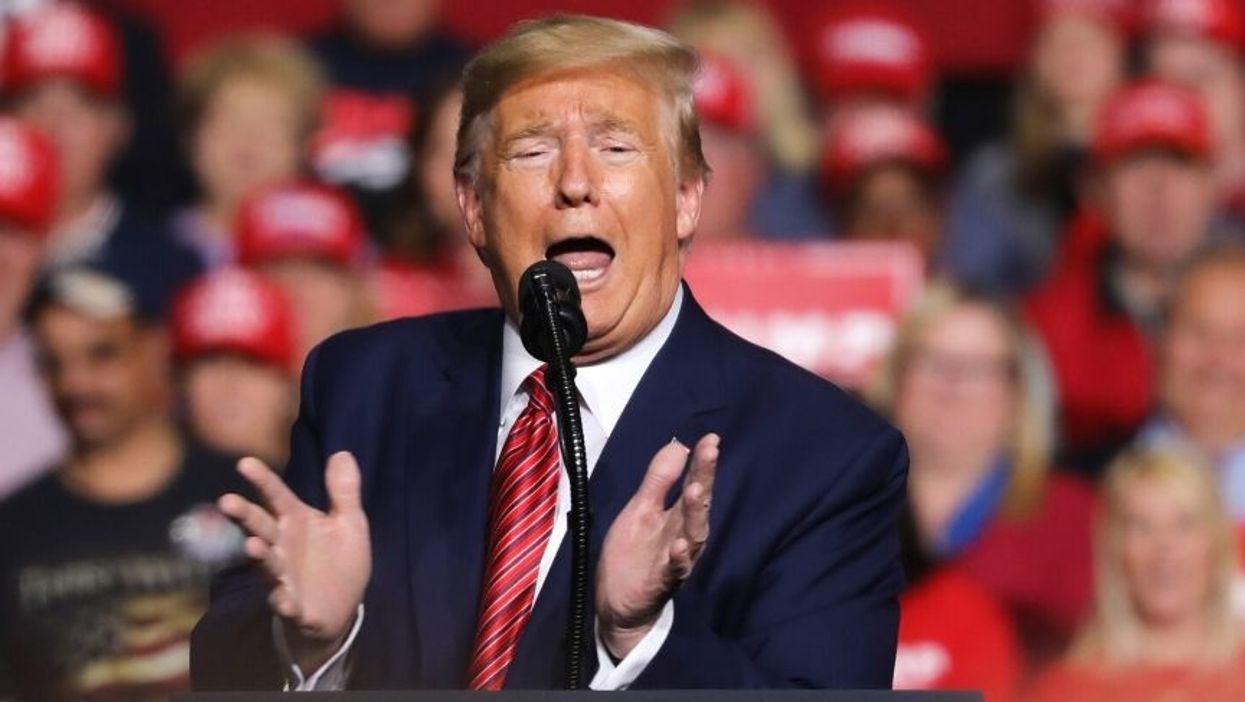 Trump Campaign Reportedly Ordered Red Trump Branded Face Masks for Supporters, Because of Course They Did