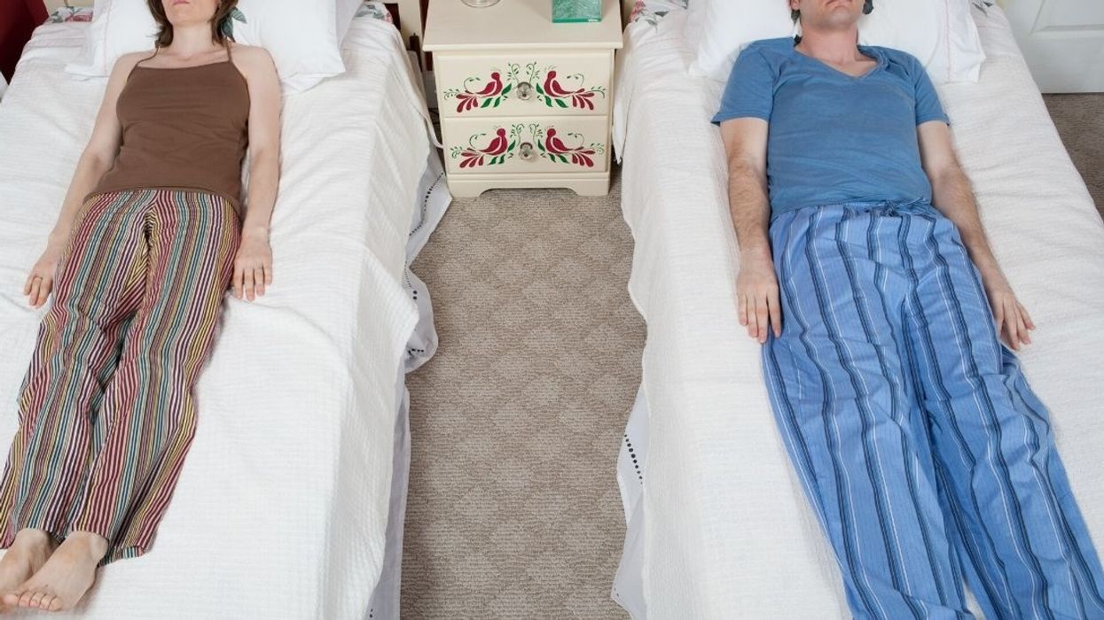 Woman Accused Of 'Ruining' Her Cousin's Marriage After Making Him And His Wife Sleep In Separate Beds While Staying With Her