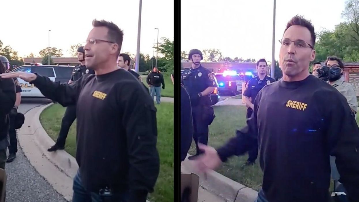 Michigan Sheriff Tosses Aside His Riot Gear To Join George Floyd Protesters In Powerful Moment Of Solidarity