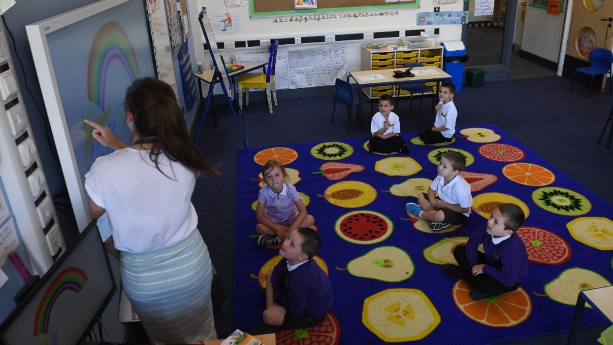 Photos Capture the 'New Normal' In England As Schools And Stores Open Back Up