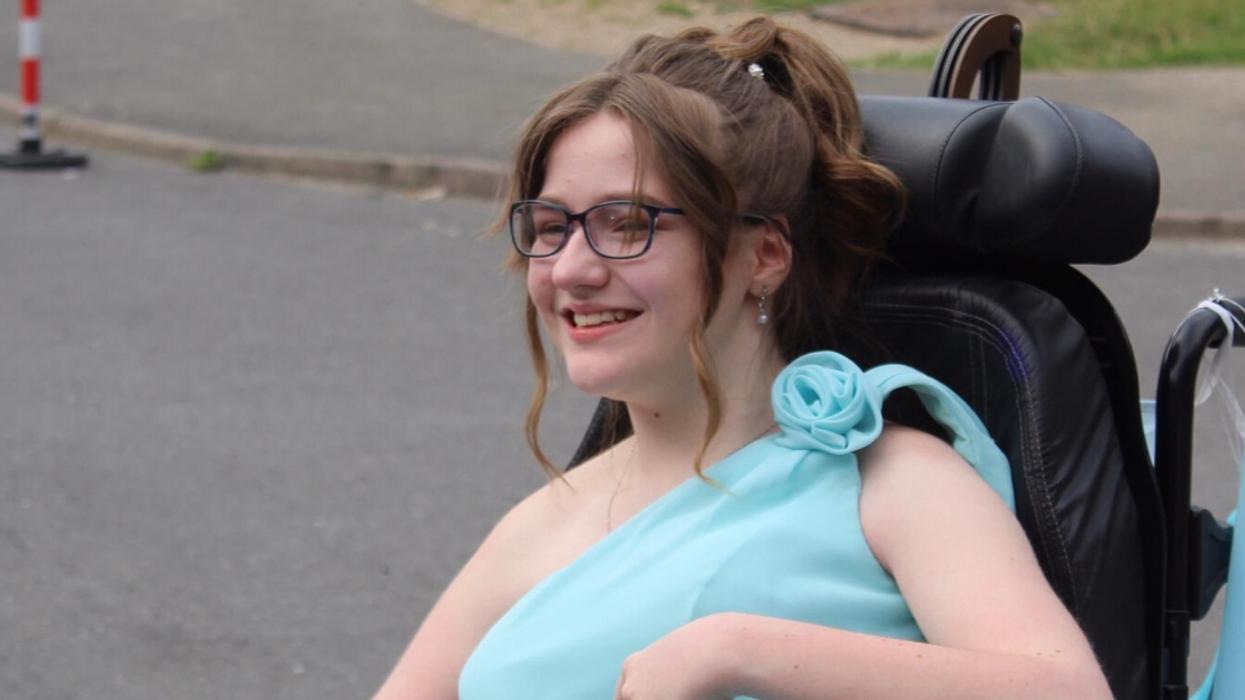 Teen With Cerebral Palsy Overcome With Emotion After Neighbors Throw Her A Surprise Prom