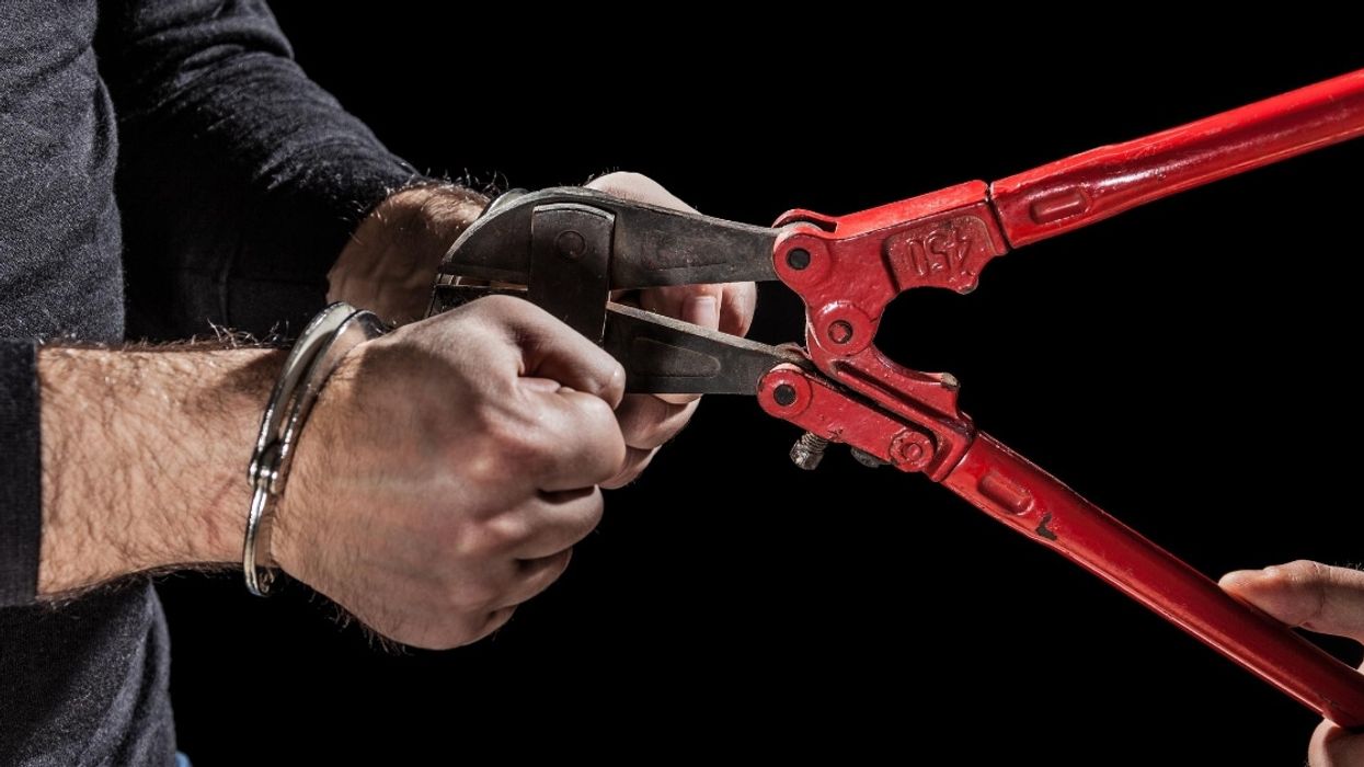 Police Officer Has To Call Fire Department After Getting Stuck In A Pair Of Faulty Handcuffs