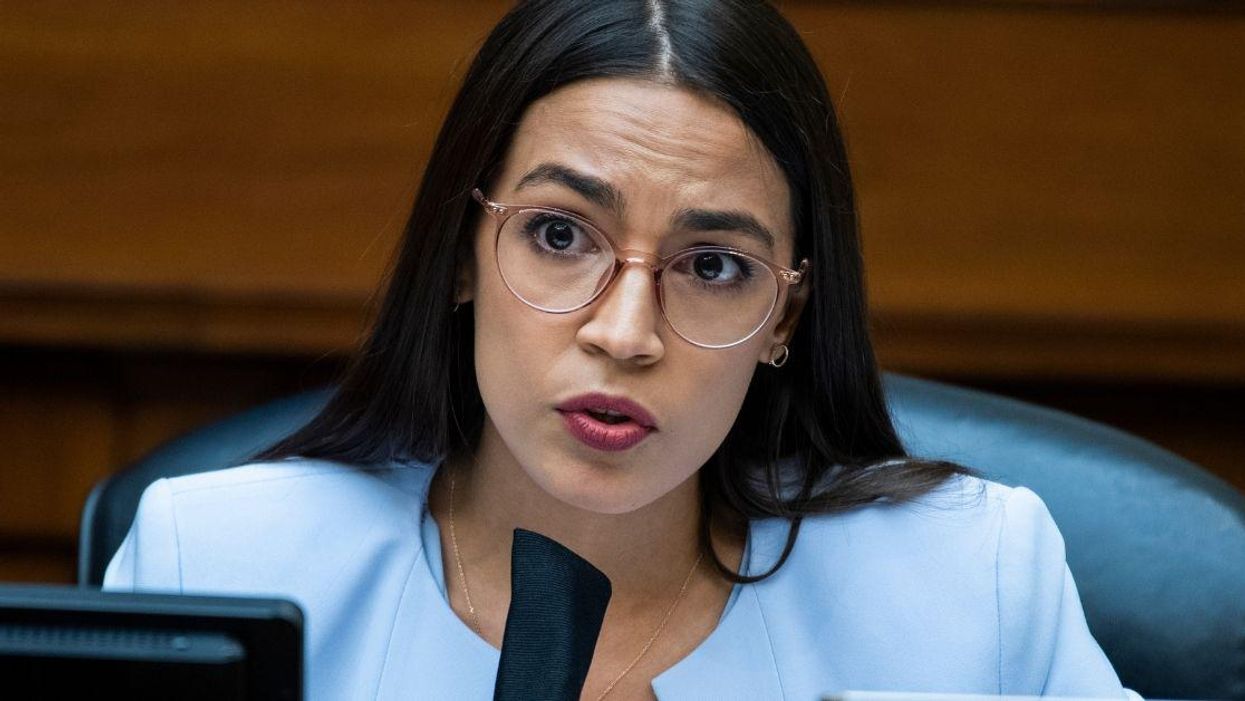 AOC Brilliantly Shuts Down Conservatives Losing Their Minds Over Her 'Tax The Rich' Sweatshirt