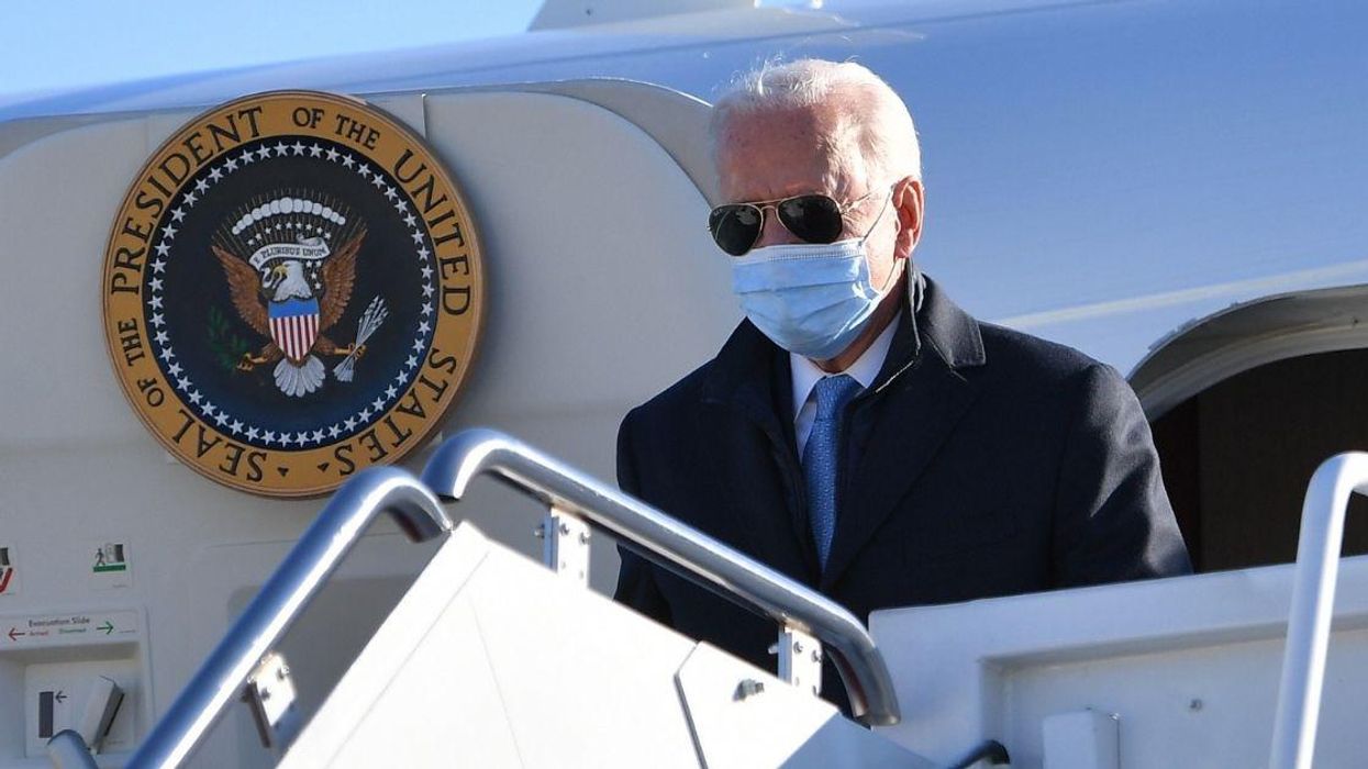 QAnoners Feel 'Betrayed' Seeing Biden Using Air Force One Since They Thought Trump Was Secretly Using It