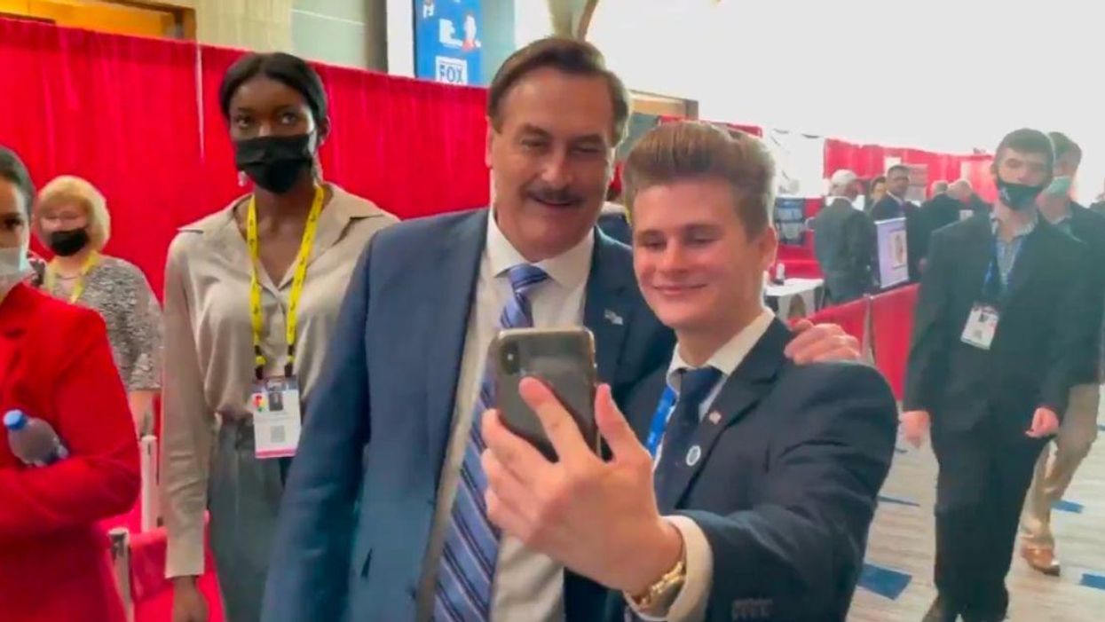 MyPillow CEO Slammed For Making CPAC Attendees Remove Masks To Take Selfies With Him