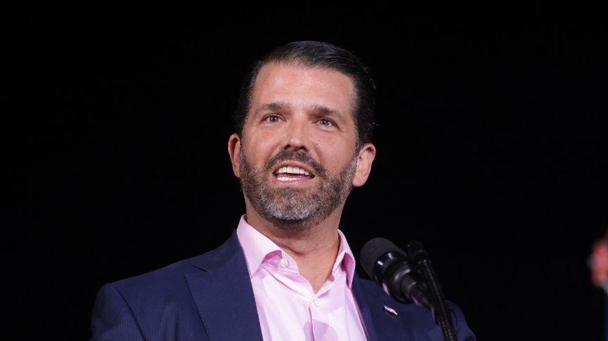 Don Jr. Seen Holding Dr. Seuss Book Super Awkwardly in Viral Photo—and People Think They Know Why