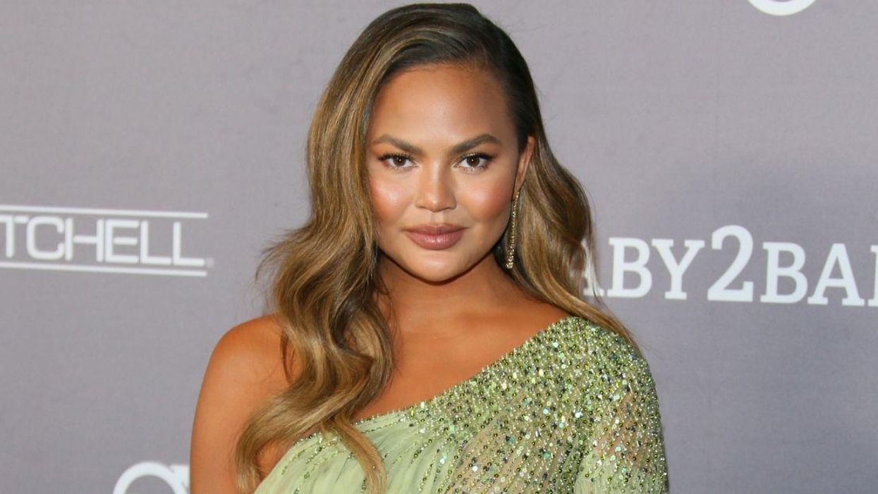 Chrissy Teigen Just Debuted Her New Silver 'Midlife Crisis' Hairdo—And Fans Are Rightly Obsessed